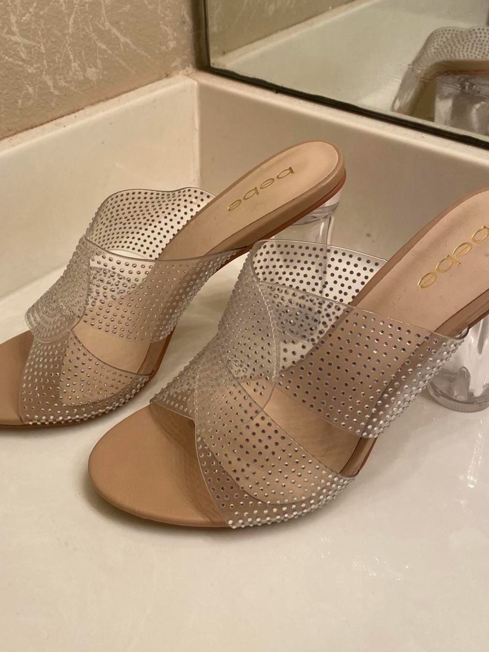 bebe Clear Rhinestone Cross-Strap Mules with Nude Footbed